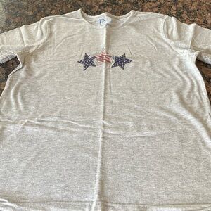 Women’s size large gray T-shirt with stars and stripes on the chest